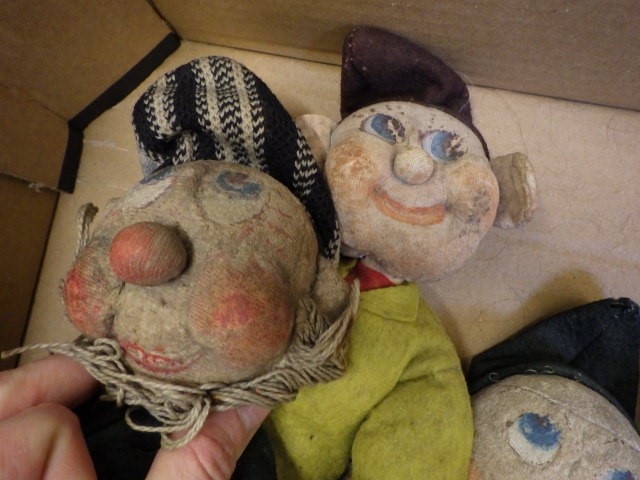 Seven artisan made Disney style dwarfs Image