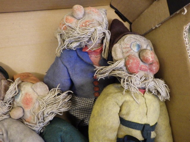 Seven artisan made Disney style dwarfs Image