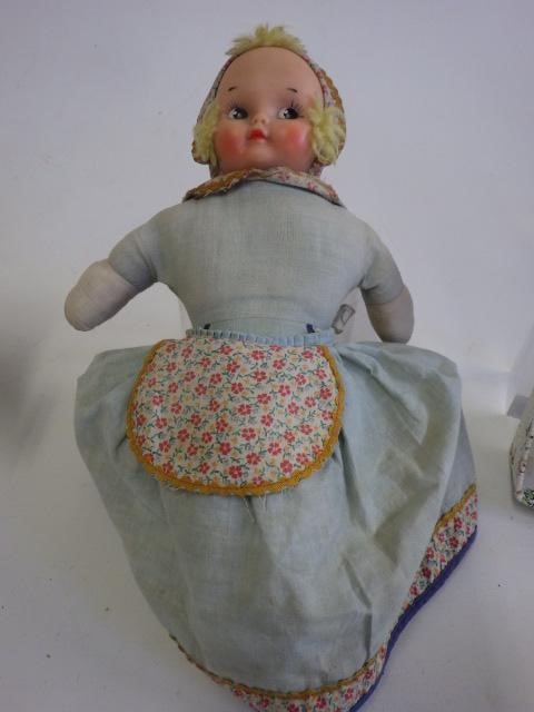 A Knickerblocker rubber and cloth two headed doll with label Image