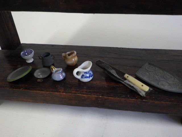 An antique doll's oak dresser Image