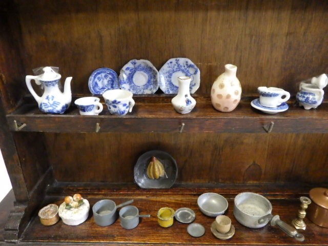 An antique doll's oak dresser Image