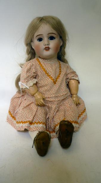 A Lanternier Limoges bisque head toddler girl doll with blue glass sleeping eyes Image