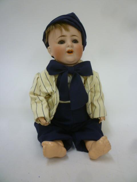 An Alt Beck & Gottschalck bisque head body character doll with blue glass sleeping eyes Image
