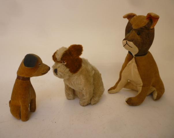 A googly eyed seated dog with swivel head Image