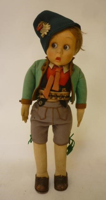 A Lenci felt covered googly doll with moulded painted face Image