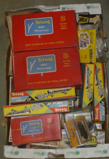 Twenty six various small plastic kits Image