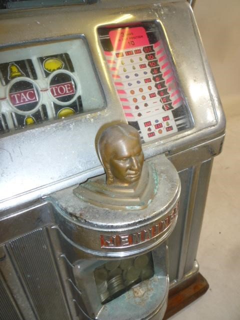 A Jennings "Governor" fruit machine with chromium plated metal and wood case Image