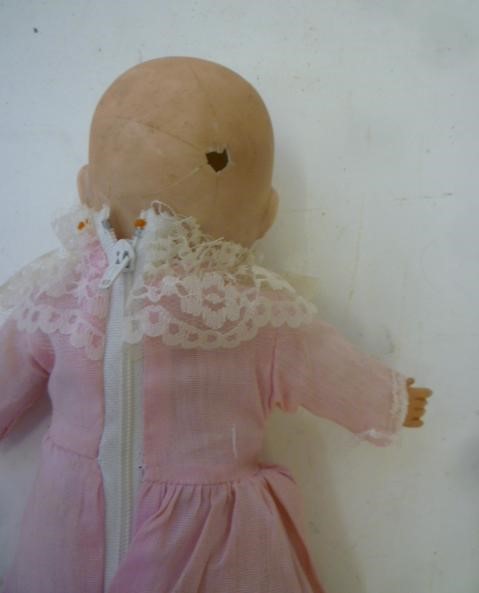 Four Armand Marseille bisque head baby dolls with blue glass sleeping eyes Image