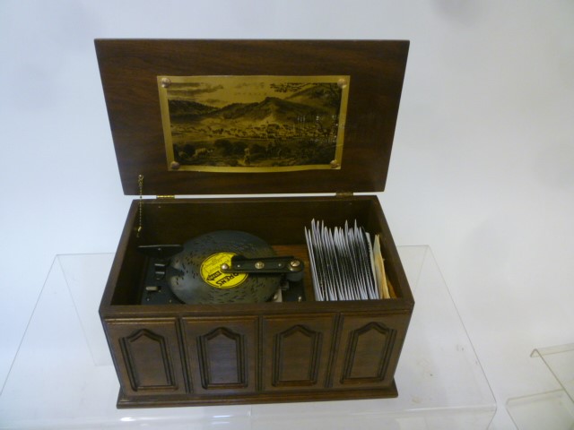 A Thorens disc musical box in panelled wood box Image