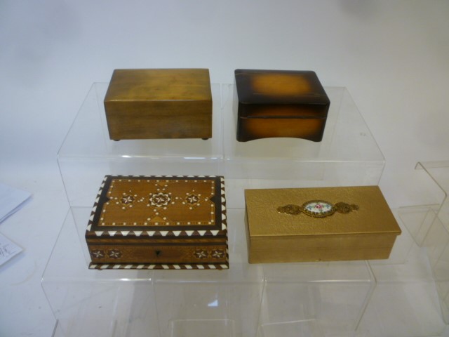 Four musical jewel boxes comprising marquetry and bone inlaid box with silk interior Image