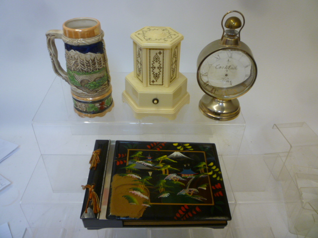 Four musical items comprising a photo album with Chinese lacquered and painted covers Image