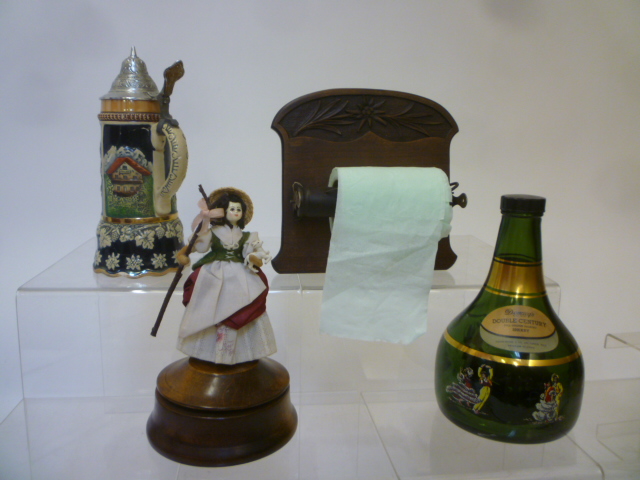 Four musical items comprising a shepherdess doll revolving on turned wood base with Reuge movement Image