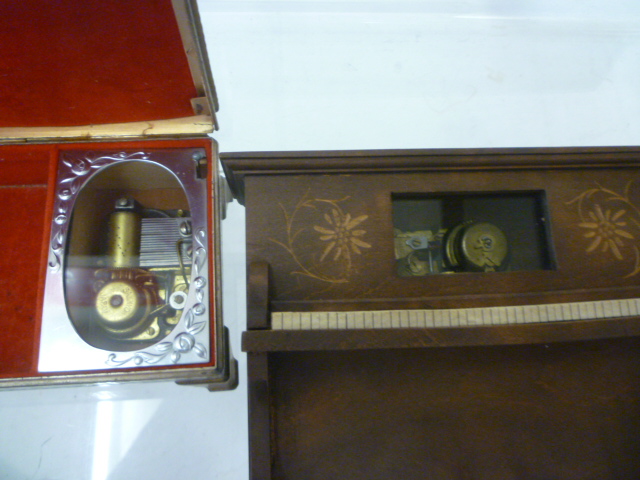 Three musical items comprising a pianola in stained wood case with Swiss two tune movement playing Image