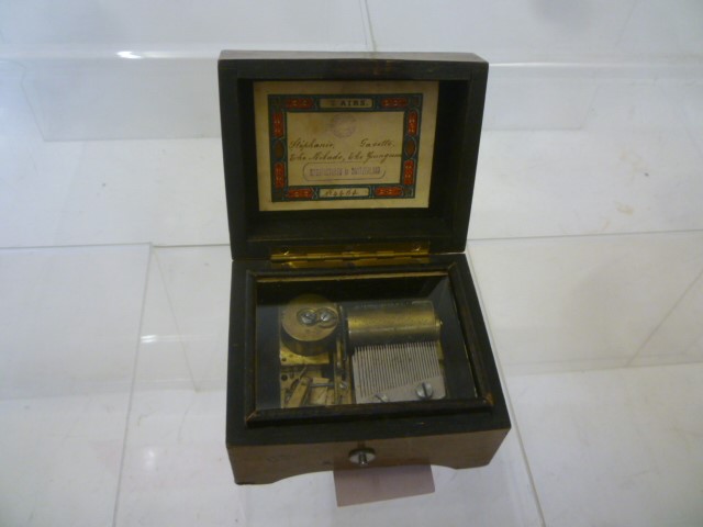 A Swiss miniature musical box with comb and drum movement playing two airs Image