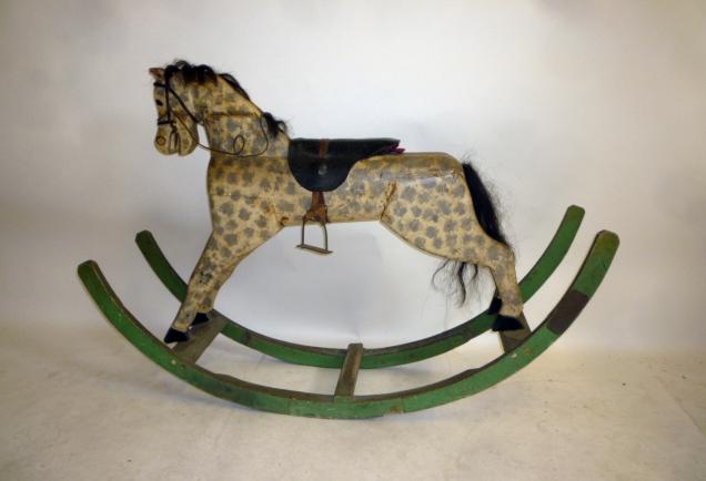 A medium rocking horse on bow rockers Image