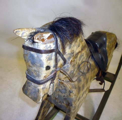 A medium rocking horse on bow rockers Image