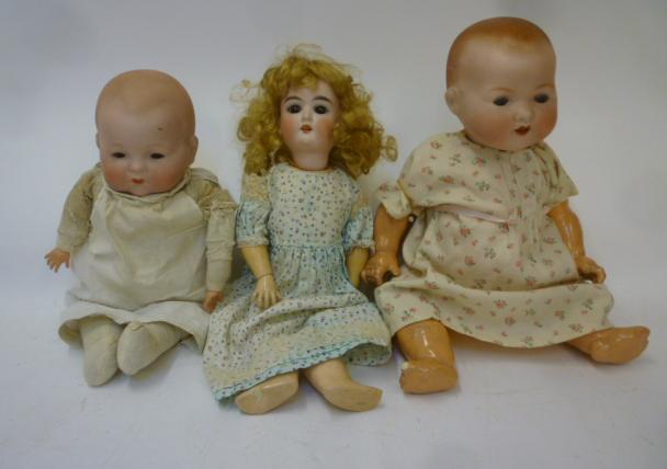 Three Armand Marseille bisque head dolls Image
