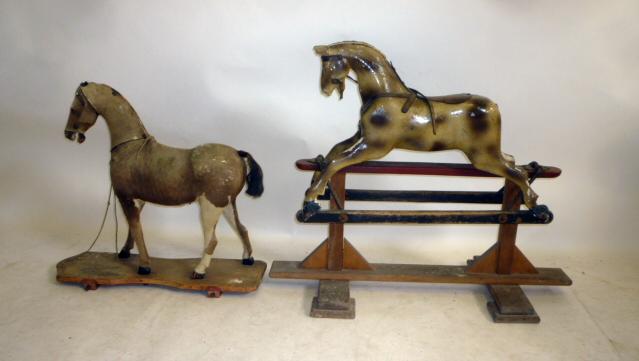 A small skin covered pull-along horse Image