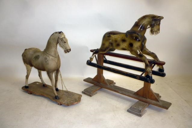 A small skin covered pull-along horse Image