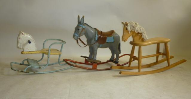 A toddler's rocking horse by Alan Newhouse in varnished beech with mop-rope mane and tail Image