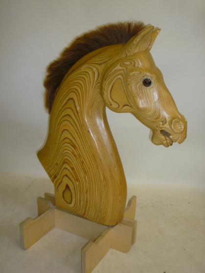 A near life size horse's head carved by Anthony Dew Image