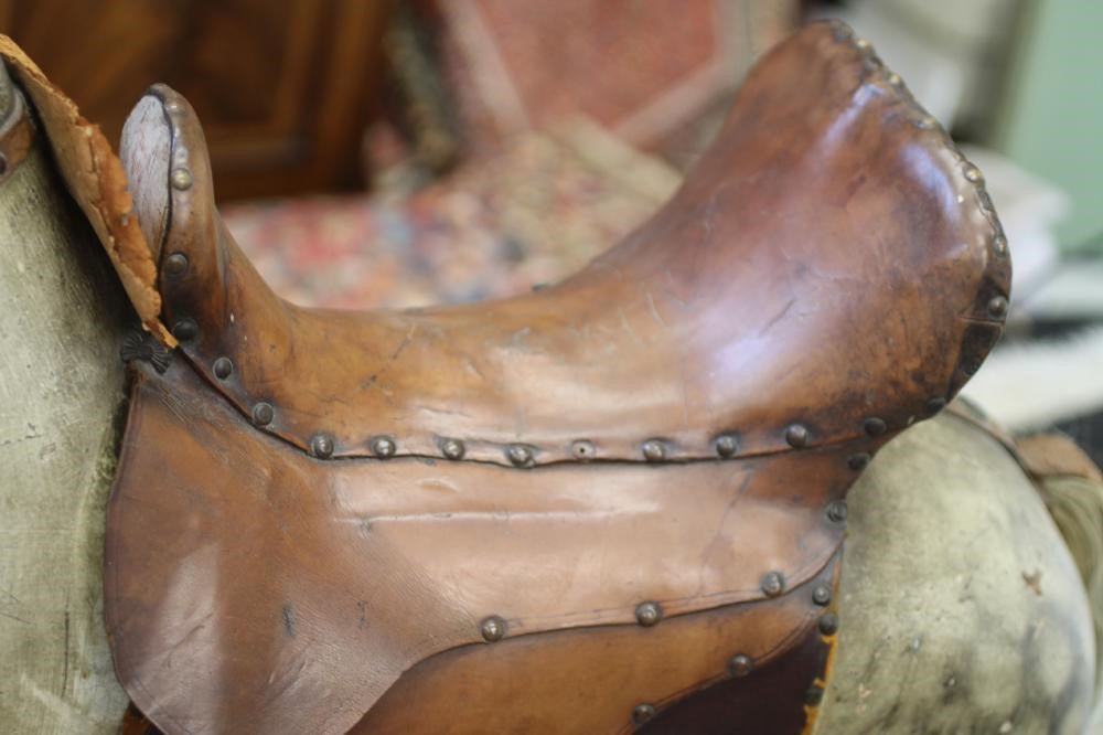 A large "Bronko" rocking horse Image