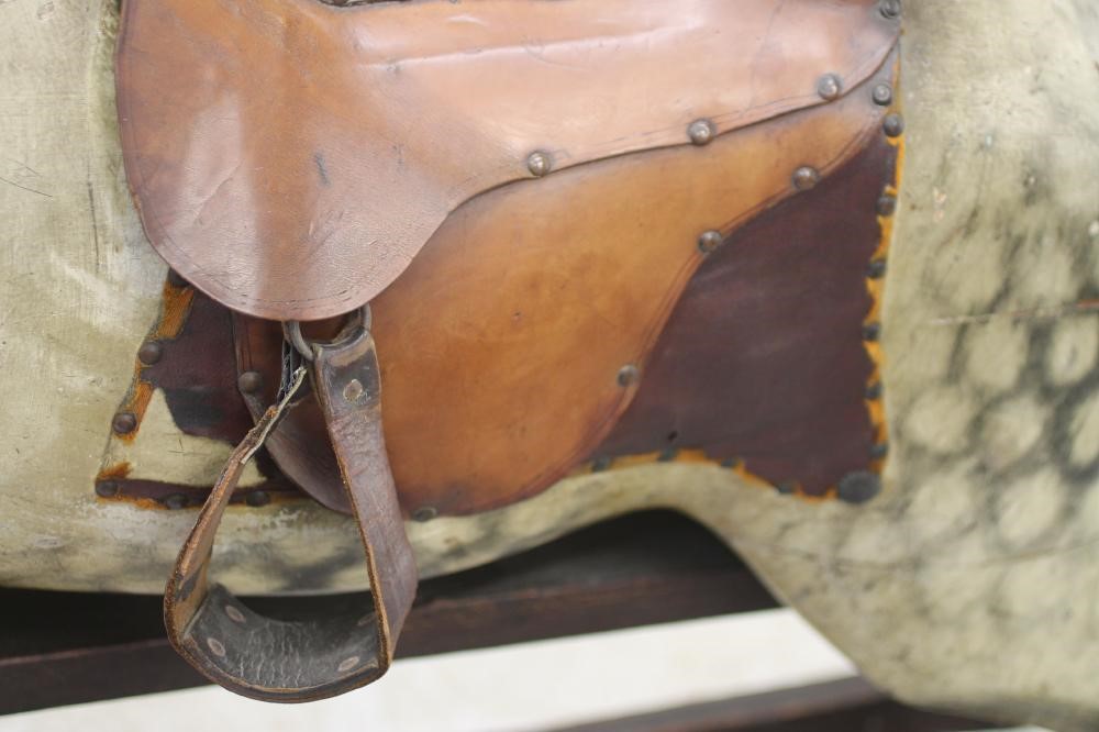 A large "Bronko" rocking horse Image