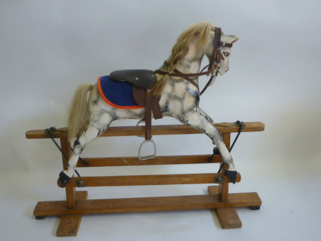 A small rocking horse probably by Collinson on safety stand Image