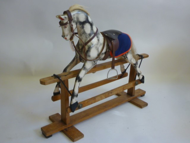 A small rocking horse probably by Collinson on safety stand Image