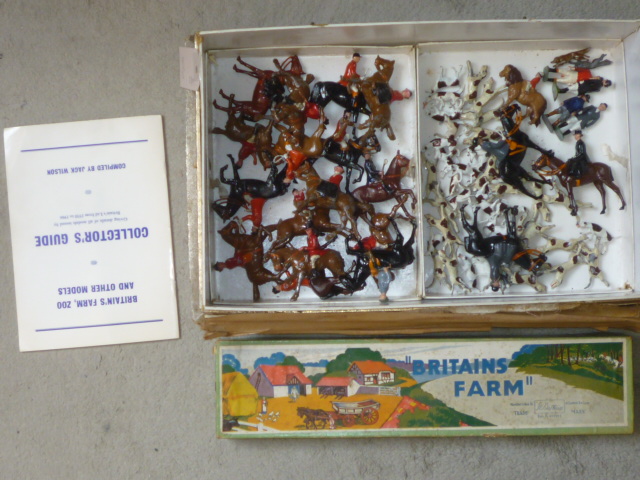 A large quantity of Britains metal hunt figures and hounds Image