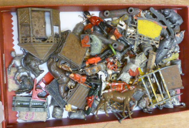 A quantity of Britains and other lead farm figures Image