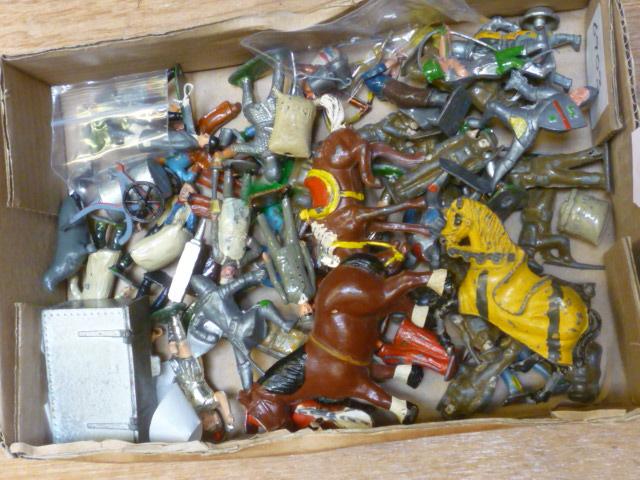 A quantity of Britains and other lead farm figures Image