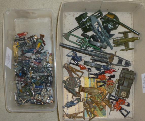 A quantity of Britains and other field guns and army figures and a quantity of Hornby O gauge Image