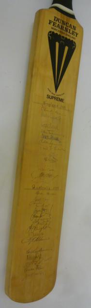 A Duncan Fearnley cricket bat autographed by the 1989 test cricket squads for England and Australia Image