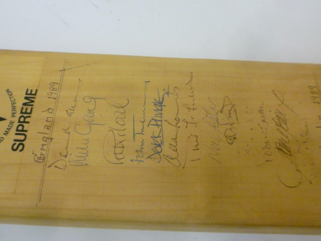 A Duncan Fearnley cricket bat autographed by the 1989 test cricket squads for England and Australia Image