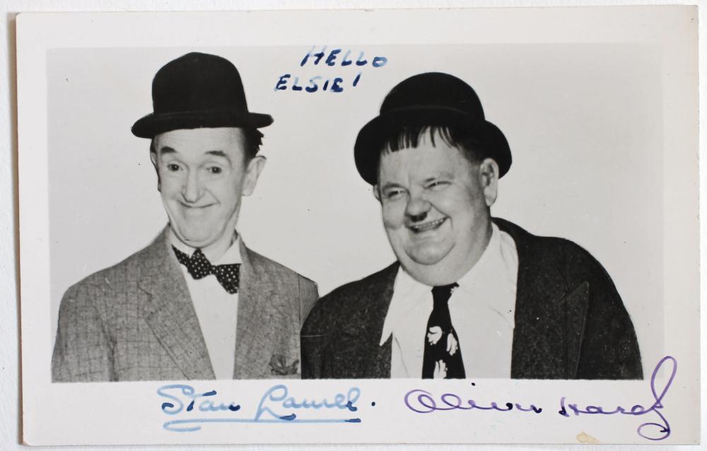 An autographed photograph of Stan Laurel and Oliver Hardy Image