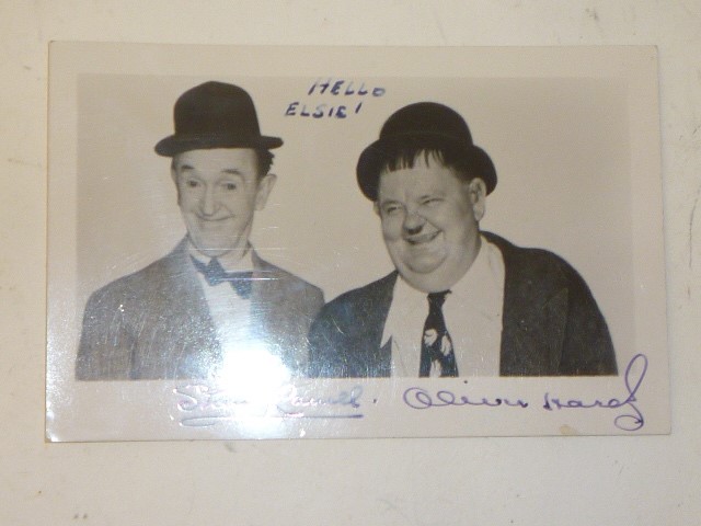 An autographed photograph of Stan Laurel and Oliver Hardy Image