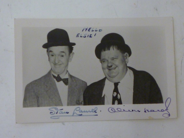 An autographed photograph of Stan Laurel and Oliver Hardy Image