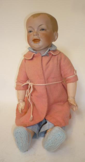 An S.F.B.J. character boy doll with bisque head Image
