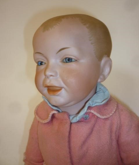 An S.F.B.J. character boy doll with bisque head Image