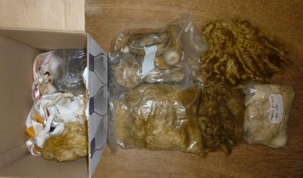 A quantity of dolls wigs Image