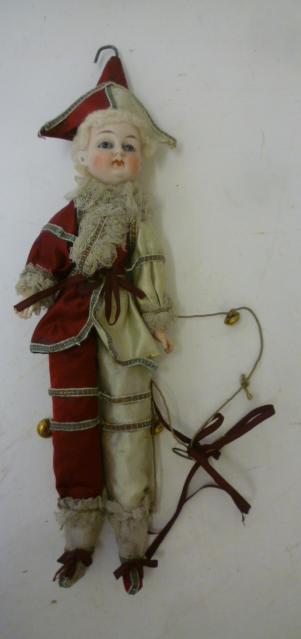 A French Polichinelle type doll with bisque head Image