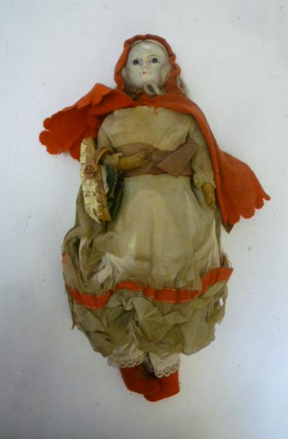 A papier mache shoulder head doll Image