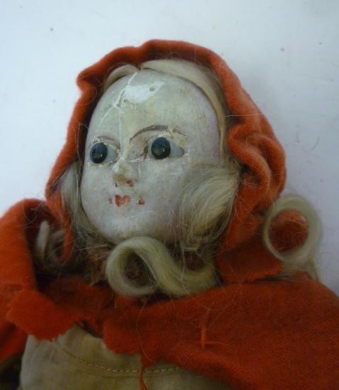 A papier mache shoulder head doll Image