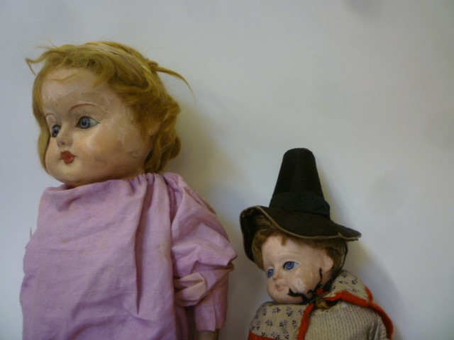 Two composition dolls comprising early 20th century doll with inset blue glass eyes Image