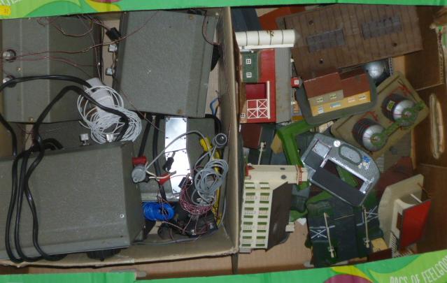 A quantity of N gauge buildings and four 12v train controllers by H & M Image