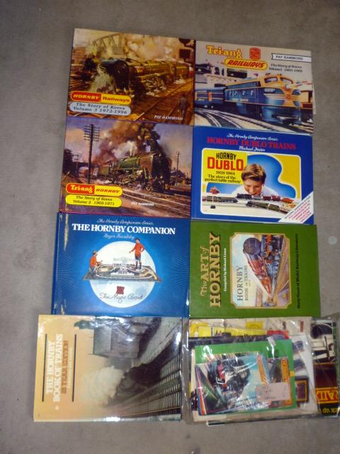 Seven volumes of books Image