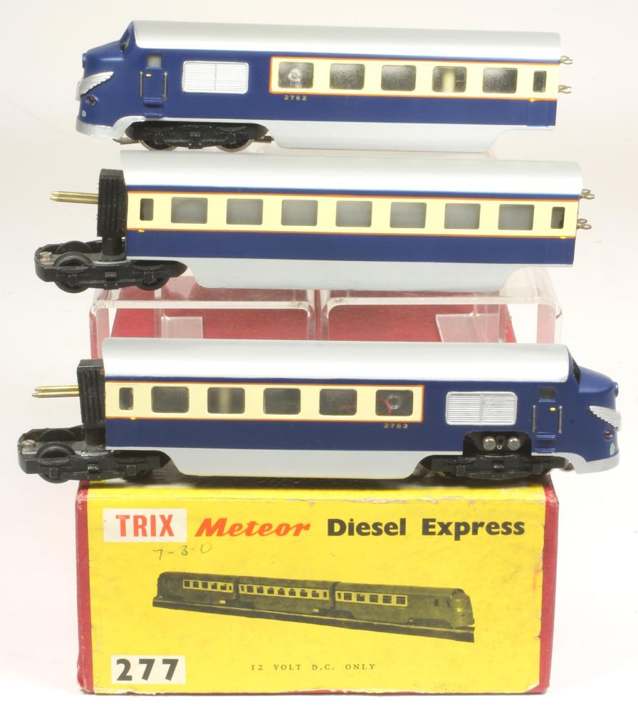 Trix Meteor Diesel Express three coach train finished in blue and cream Image