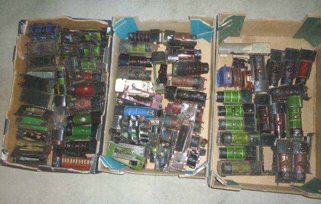 Approximately sixty playworn locomotive bodies and other items Image
