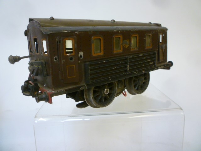 Playworn Marklin O gauge trains including 0-4-0 electric locomotive in brown Image